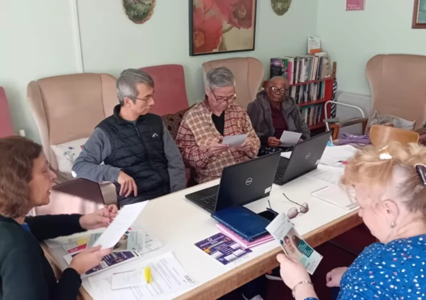 Barnet residents looking at leaflets