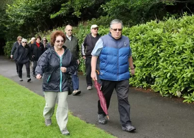 Older people walking together in a park