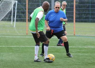 Two men playing walking football