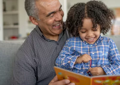 grandad with child, smiling