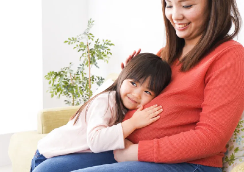 pregnant mum and child