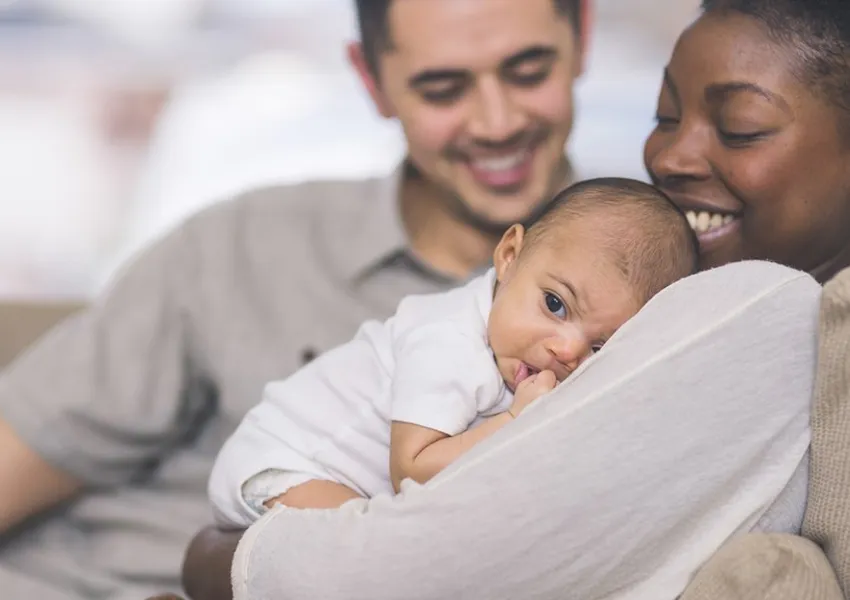 A young family with new born baby
