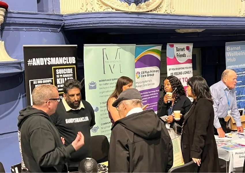 Community engaging with stallholders