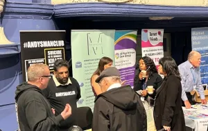 Community engaging with stallholders