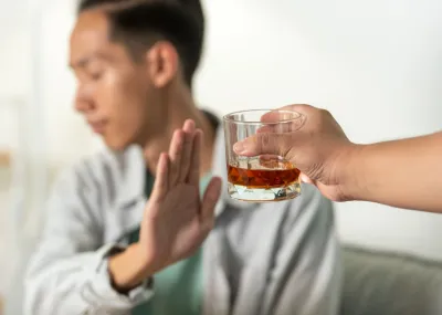 Man refusing an alcoholic drink